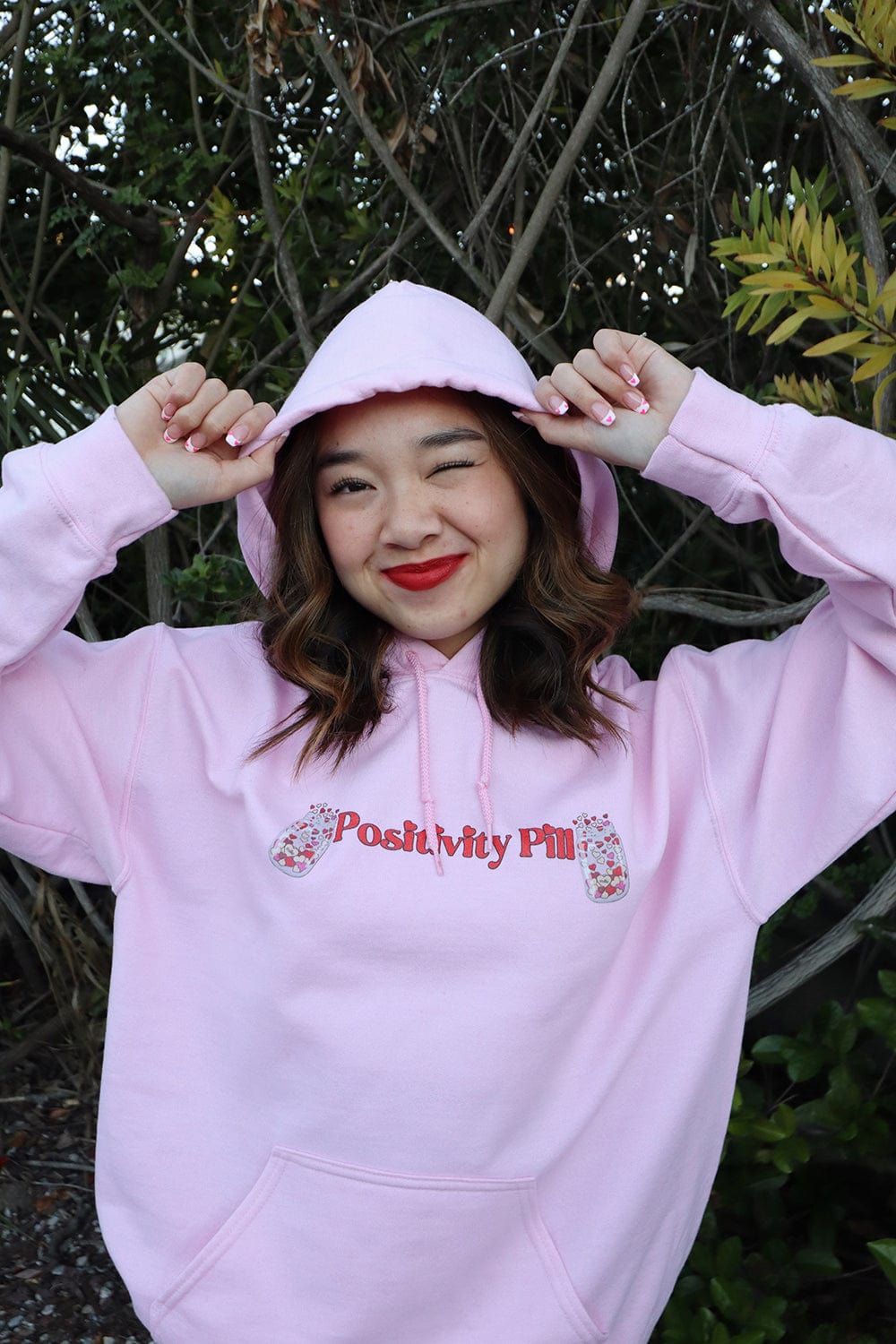 Nicole Laeno: Positivity Pill Pink Hoodie