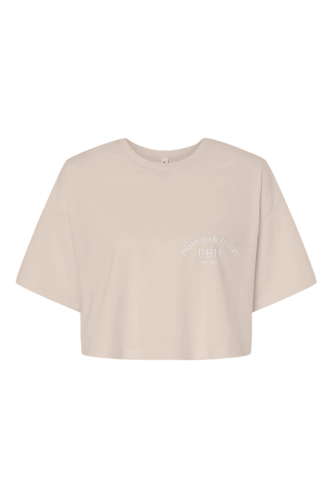 Raven Ross: Pilates Body Hottie Cream Crop Shirt – Fanjoy