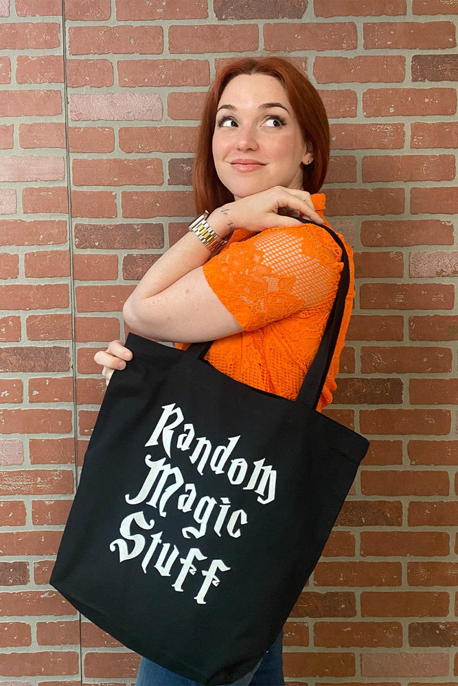 
                  
                    Wizards Of Waverly Pod: Random Magic Stuff Black Tote Bag
                  
                