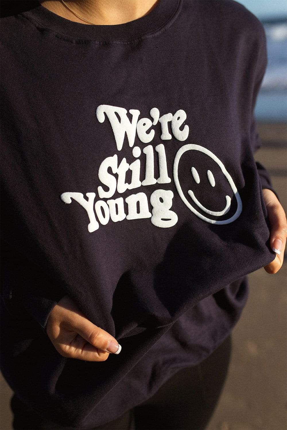 Fanjoy: We’re Still Young Navy Crewneck