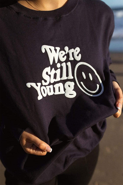 Fanjoy: We’re Still Young Navy Crewneck