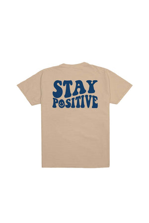 
                  
                    Mariah & Bill: Stay Positive Sand Shirt
                  
                