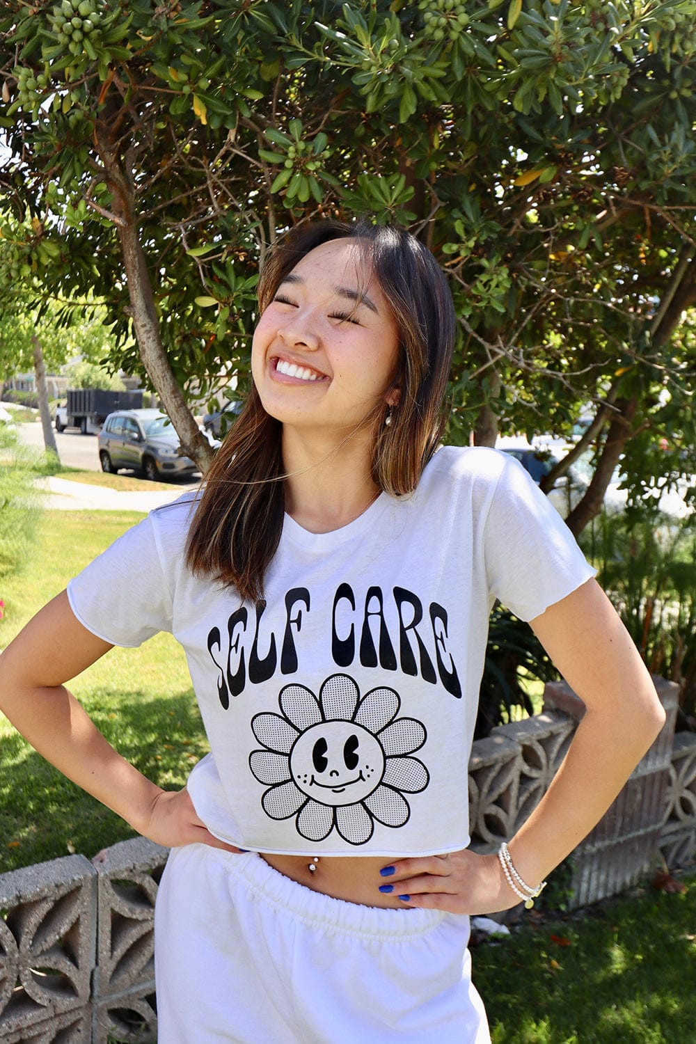 Nicole Laeno: Self Care White Cropped Tee