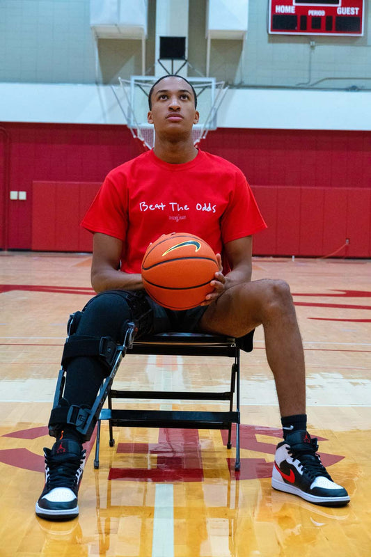 Nimari Burnett: Beat The Odds Red Shirt