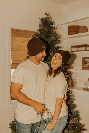
                  
                    The Cordle's: Smiley Brown Beanie
                  
                